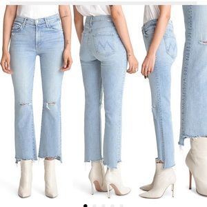 Mother step hem jeans